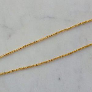 Guldfärgat halsband med en druzyconnector i olika färger