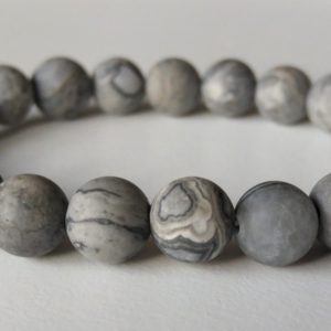 Elastiskt armband med frostad netstone