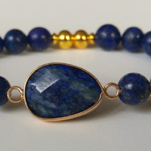 Guldfärgad lapis lazuli-connector med lapis lazulipärlor