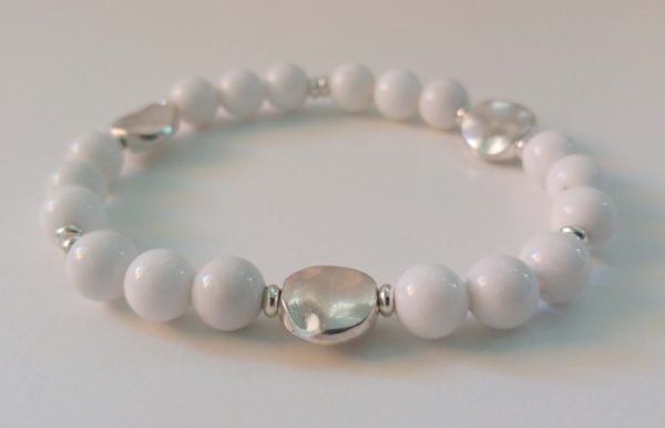 Elastiskt armband med silverfärgade asymmetriska mellandelar - Bild 3